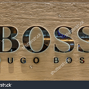 stock-photo-bangkok-may-hugo-boss-logo-at-suvanaphumi-airport-bangkok-on-may-it-is-a-german-luxury-195746804.jpg